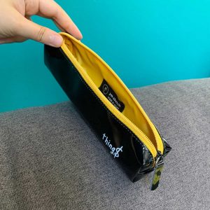 pencil case things black yellow