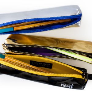 pencil case set open pens inside gold silver and black