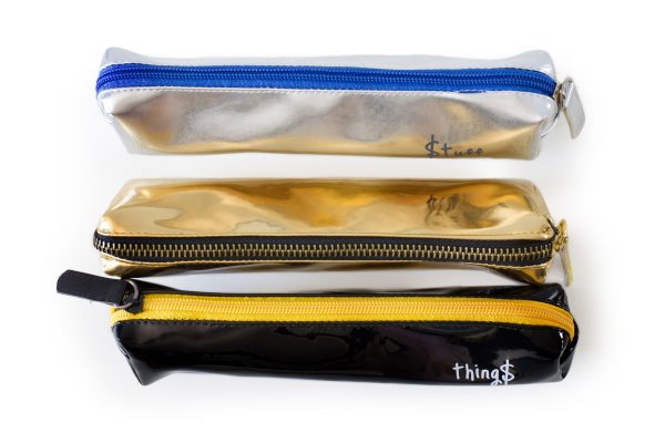 pencil case set top view gold silver and black