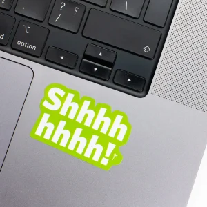 Vinyl Laptop Sticker irregular english text Shhhhh shape with green lime 3mm outline round corner and white text on macbook beside keyboard