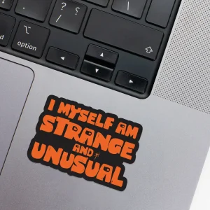 Vinyl Laptop Sticker irregular english text Unusual shape with black 3mm outline round corner and orange text on macbook beside keyboard