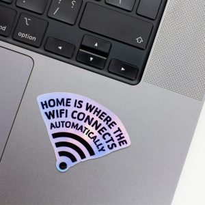 Holographic Laptop Sticker irregular wifi shape with round corner with black text on macbook beside keyboard with inner fill shiny metallic rainbow effect